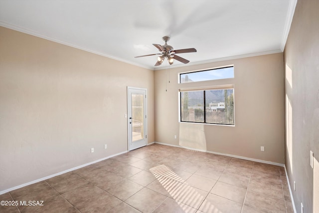 tiled empty room featuring ceiling fan and ornamental molding