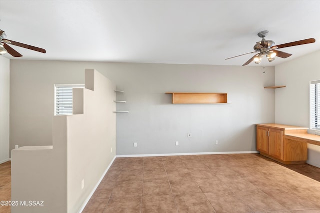 empty room featuring ceiling fan