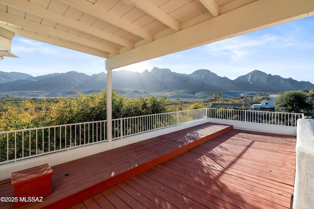 wooden terrace with a mountain view