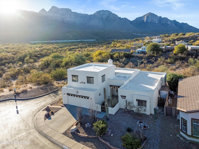 bird's eye view with a mountain view