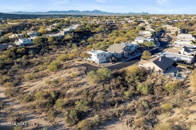 drone / aerial view featuring a mountain view