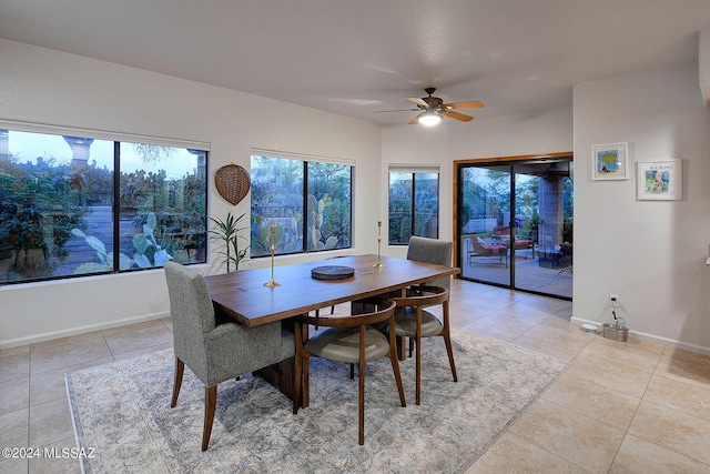 dining room featuring ceiling fan and light tile patterned flooring