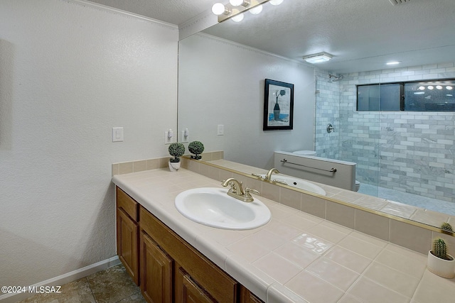 bathroom featuring walk in shower, vanity, a textured ceiling, and ornamental molding