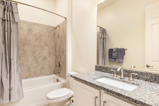 full bathroom with toilet, vanity, and shower / bathtub combination with curtain