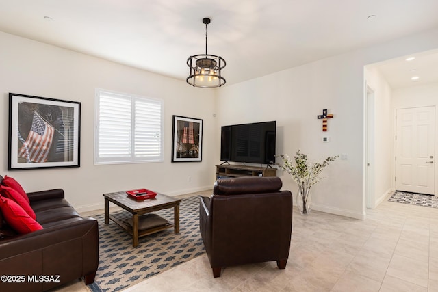 living room with a notable chandelier