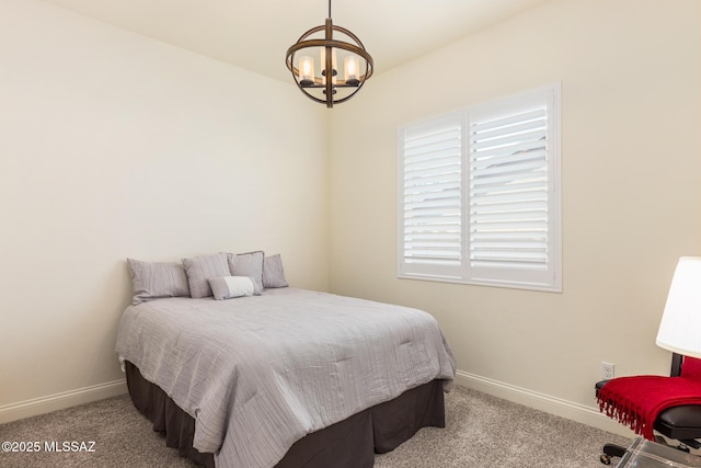 bedroom with light carpet and an inviting chandelier