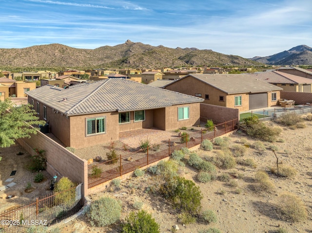 exterior space featuring central AC and a mountain view