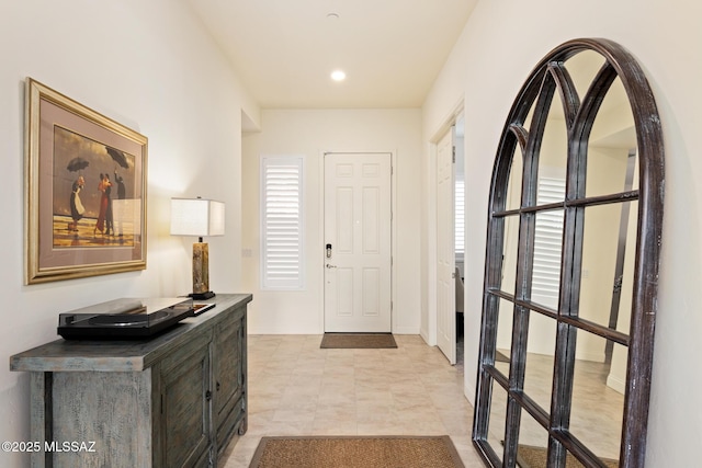 view of tiled foyer entrance