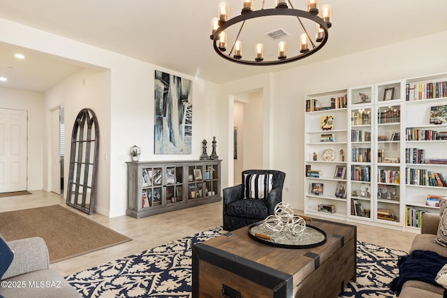 living room with a notable chandelier