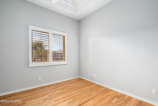 spare room with ceiling fan and light hardwood / wood-style floors