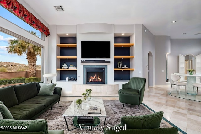 living room with built in shelves