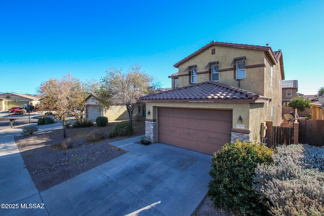 view of front of property with a garage