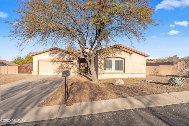 view of front of property with a garage