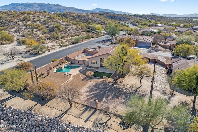 drone / aerial view featuring a mountain view