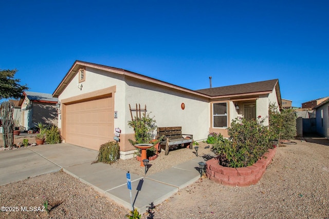 ranch-style home featuring a garage