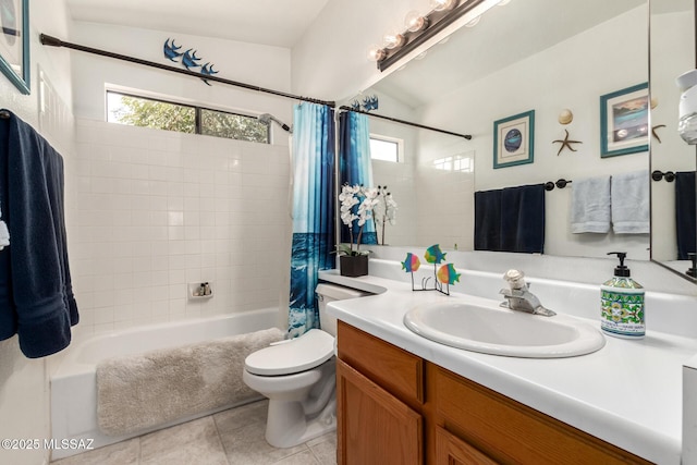 full bathroom featuring shower / bathtub combination with curtain, lofted ceiling, toilet, tile patterned floors, and vanity