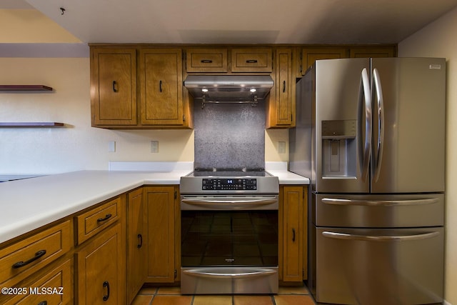 kitchen with light tile patterned floors and appliances with stainless steel finishes