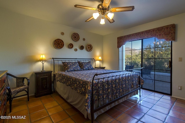 bedroom featuring tile patterned floors and ceiling fan