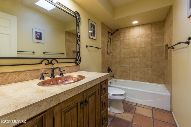 full bathroom with tile patterned floors, vanity, toilet, and tiled shower / bath