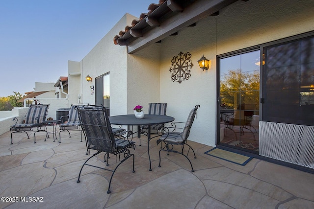 view of patio featuring central air condition unit