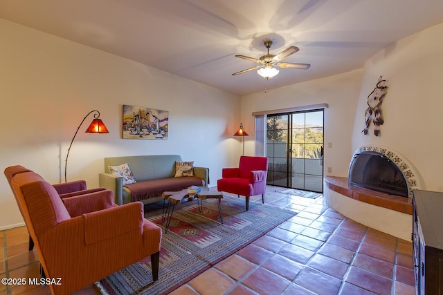 living room featuring tile patterned flooring and ceiling fan