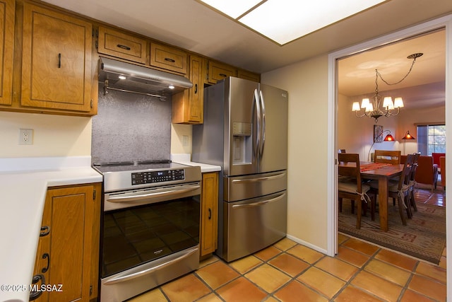 kitchen with range, hanging light fixtures, light tile patterned floors, stainless steel fridge with ice dispenser, and a chandelier