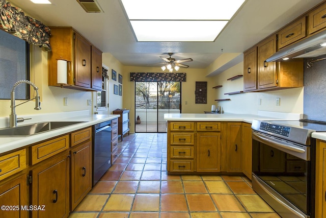 kitchen featuring ceiling fan, sink, kitchen peninsula, extractor fan, and appliances with stainless steel finishes