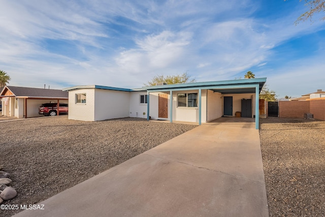 single story home with a carport