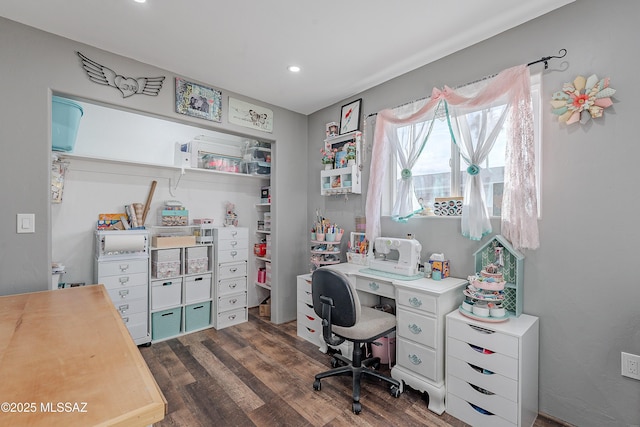 office space with dark wood-type flooring