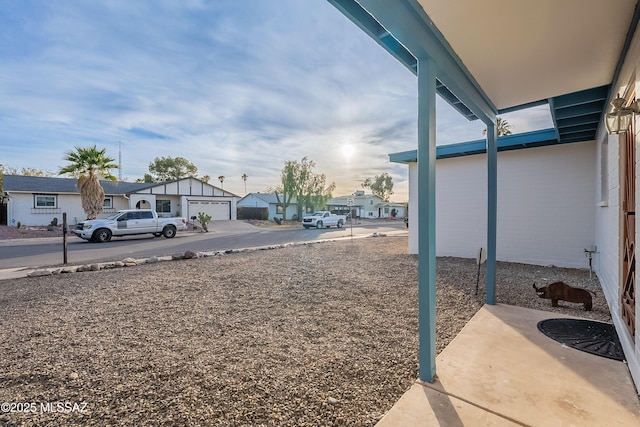 view of yard with a garage