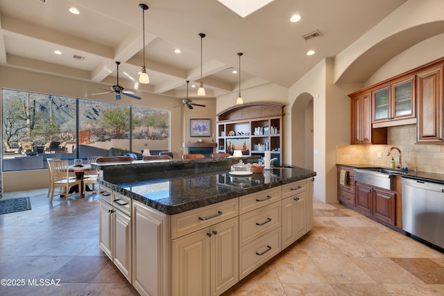 kitchen featuring sink, dark stone countertops, beam ceiling, coffered ceiling, and stainless steel dishwasher