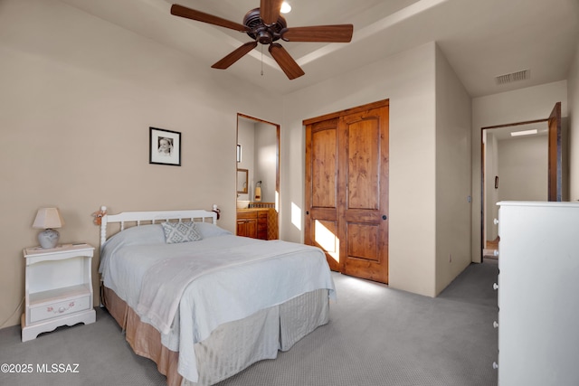 carpeted bedroom with ceiling fan