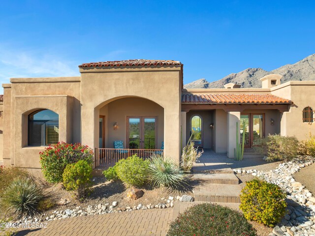 view of front facade featuring a mountain view