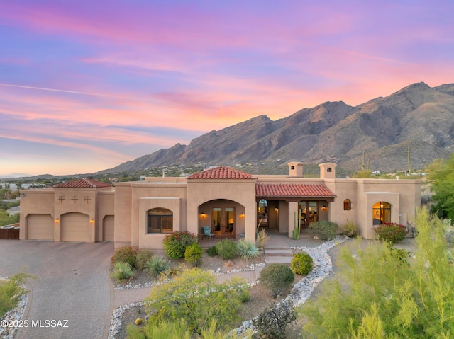 view of front of house featuring a mountain view