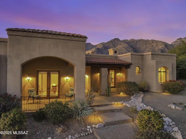 exterior space featuring a mountain view