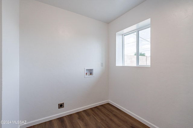 washroom featuring hookup for an electric dryer, dark wood-type flooring, and hookup for a washing machine