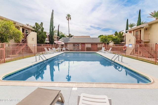 view of pool with a patio area