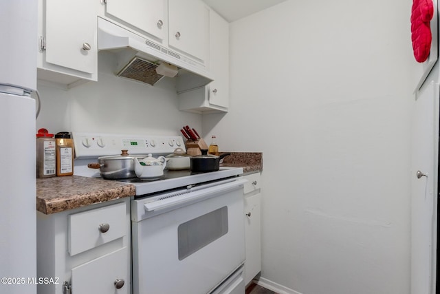 kitchen with white cabinets and white appliances