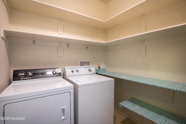 laundry area with independent washer and dryer