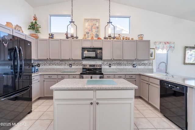 kitchen with lofted ceiling, gray cabinets, black appliances, and sink