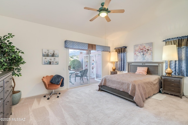 carpeted bedroom with ceiling fan and access to outside