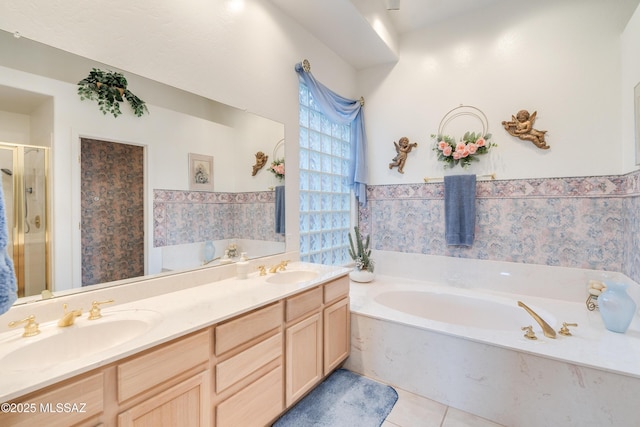 bathroom featuring vanity, tile patterned flooring, and separate shower and tub