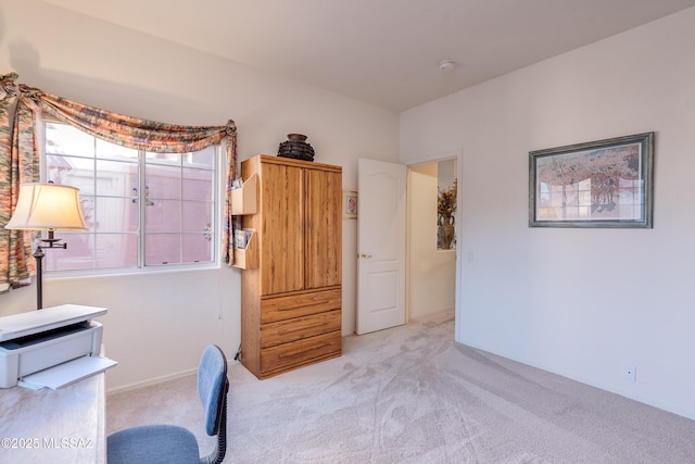 bedroom with light carpet