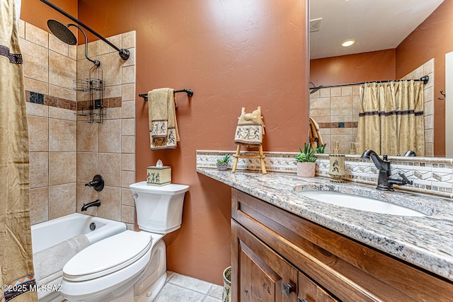 full bathroom featuring vanity, tile patterned flooring, toilet, and shower / bath combo with shower curtain