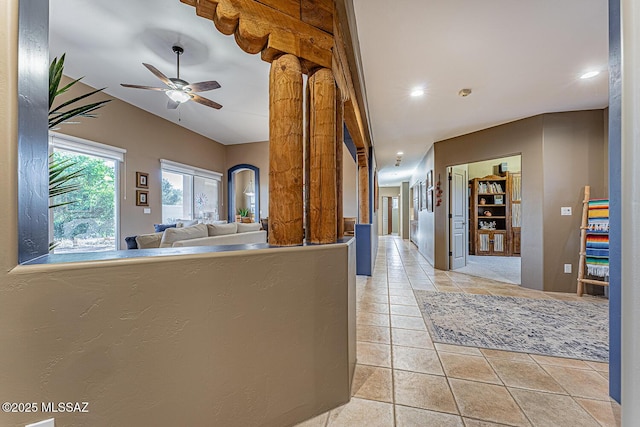 kitchen featuring light tile patterned floors and ceiling fan