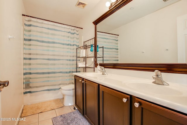 full bathroom with vanity, shower / bathtub combination with curtain, tile patterned floors, and toilet