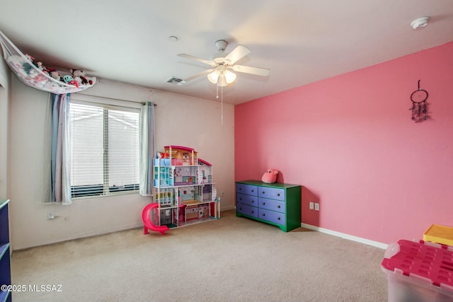 recreation room featuring carpet and ceiling fan