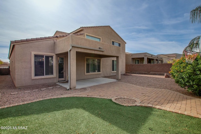 rear view of property with a patio