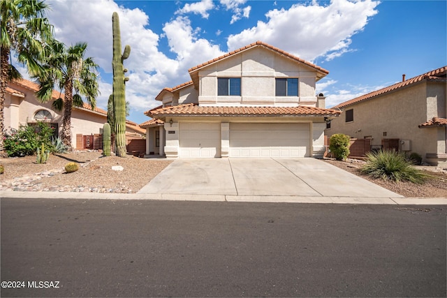 view of front of property with a garage