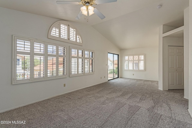 spare room with ceiling fan, carpet floors, and a healthy amount of sunlight